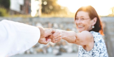 couple reaching to each other