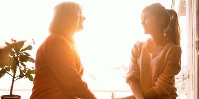 Mom and daughter in sunlight