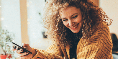 woman laughing to herself